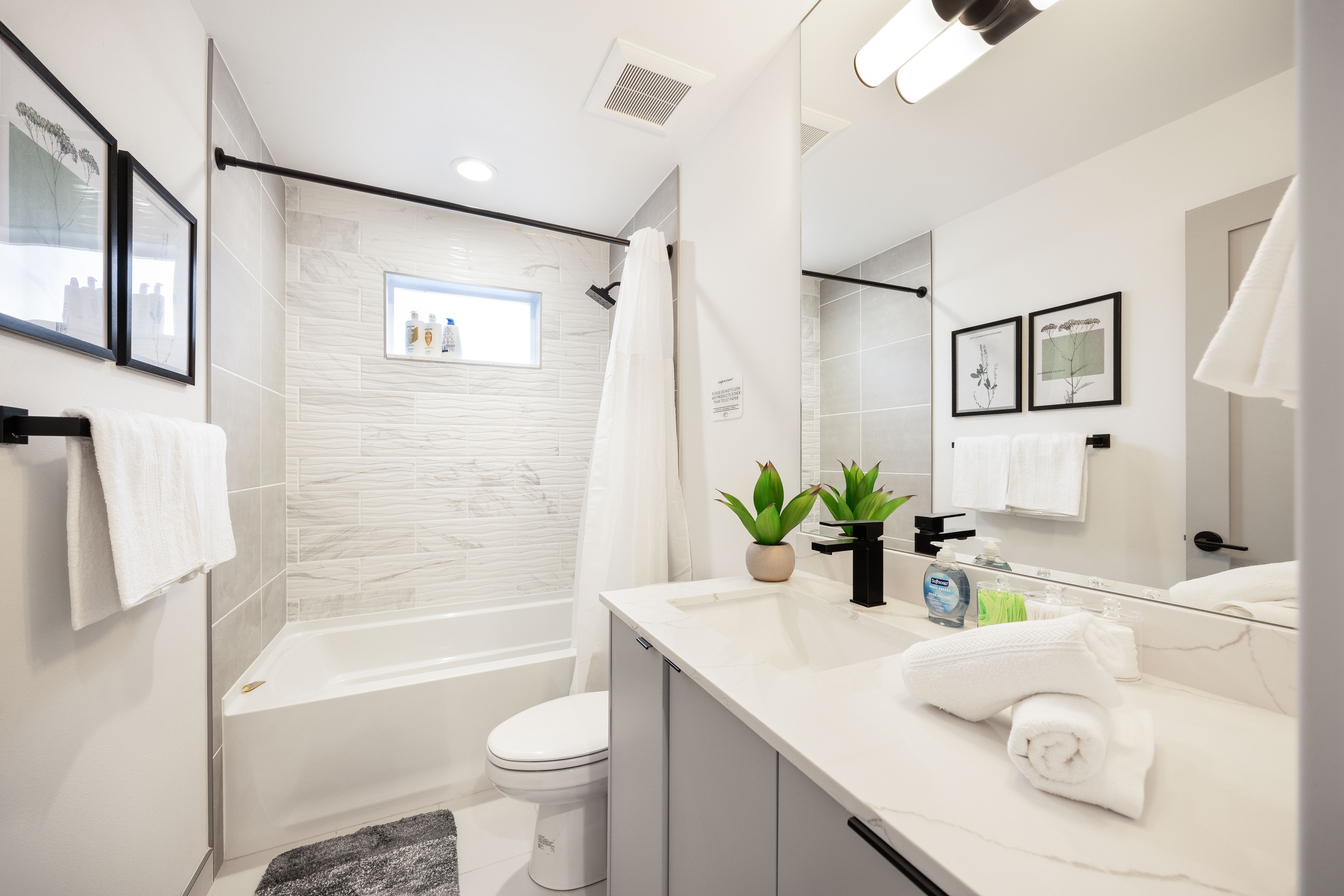 Modern bathroom with rainfall shower in Seattle vacation rental