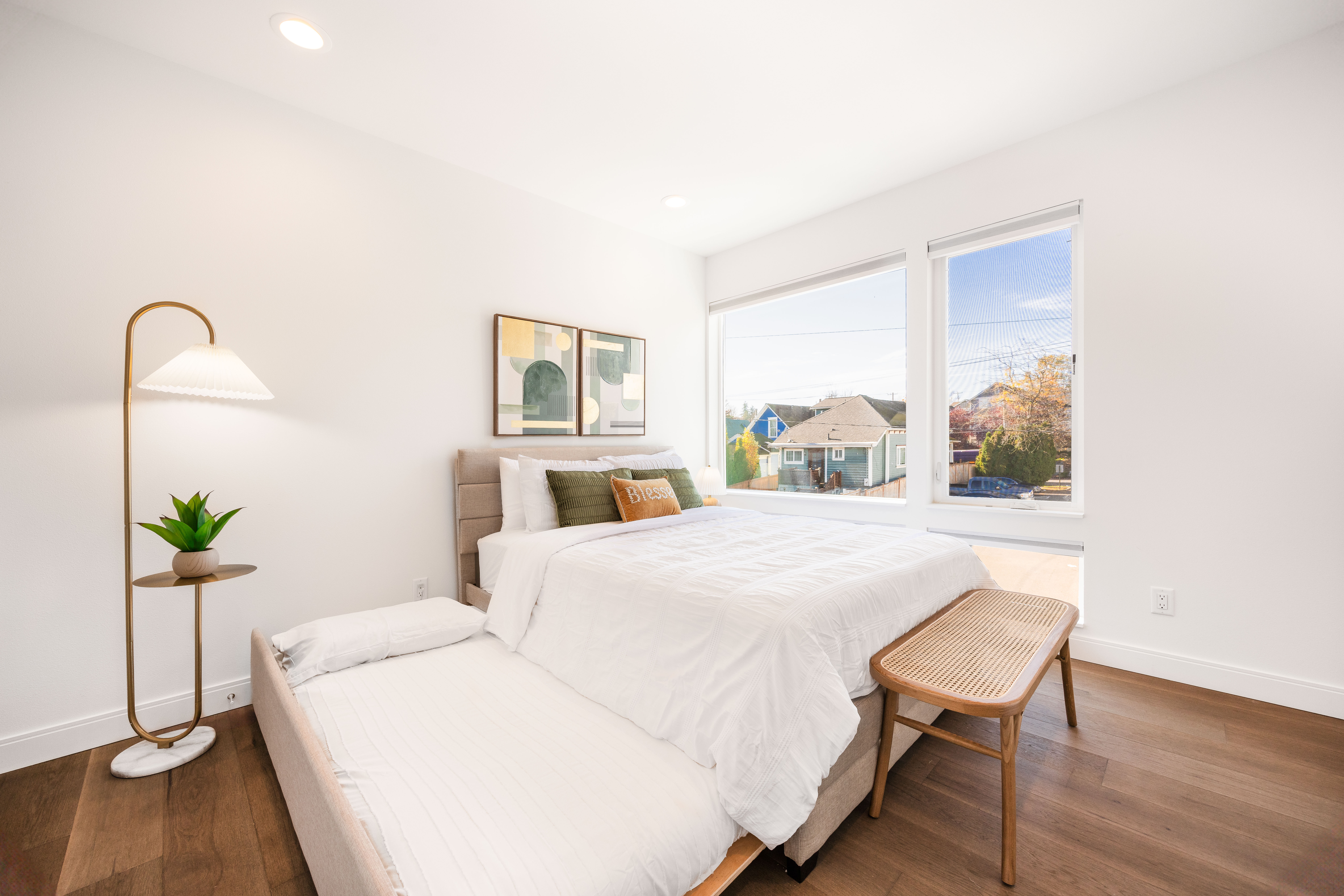 Queen bedroom with natural light and dedicated wardrobe space